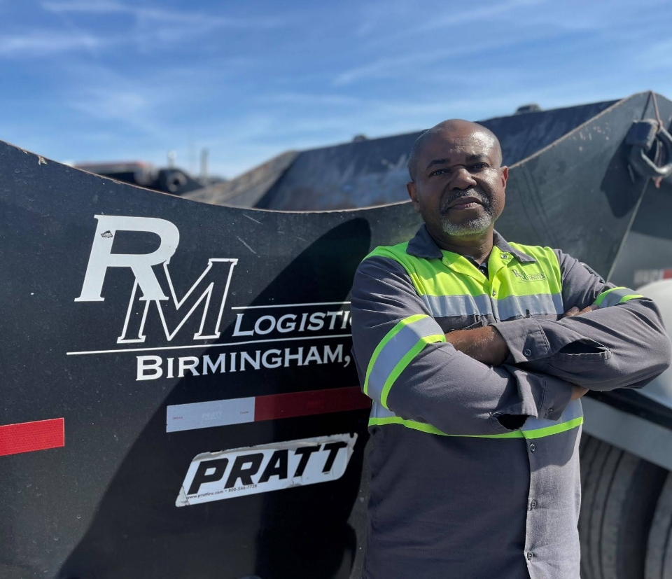 man in front of semi truck